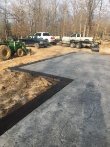 stamped concrete bordered patio 2023